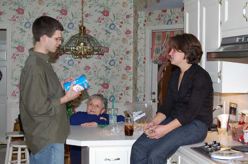 Christmas 0539.JPG - Jan & Bill tell James & Gretchen about James' "rubber chicken" meal at Wind Cave National Park (South Dakota) in 1978 during our return from California.